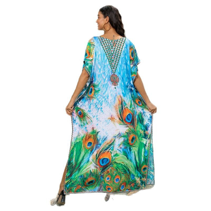 Dame Strandkaftan med kunstnerisk påfuglemotiv og fine detaljer Stilla
