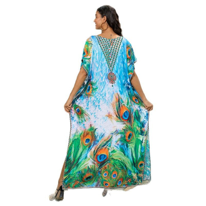 Dame Strandkaftan med kunstnerisk påfuglemotiv og fine detaljer Stilla