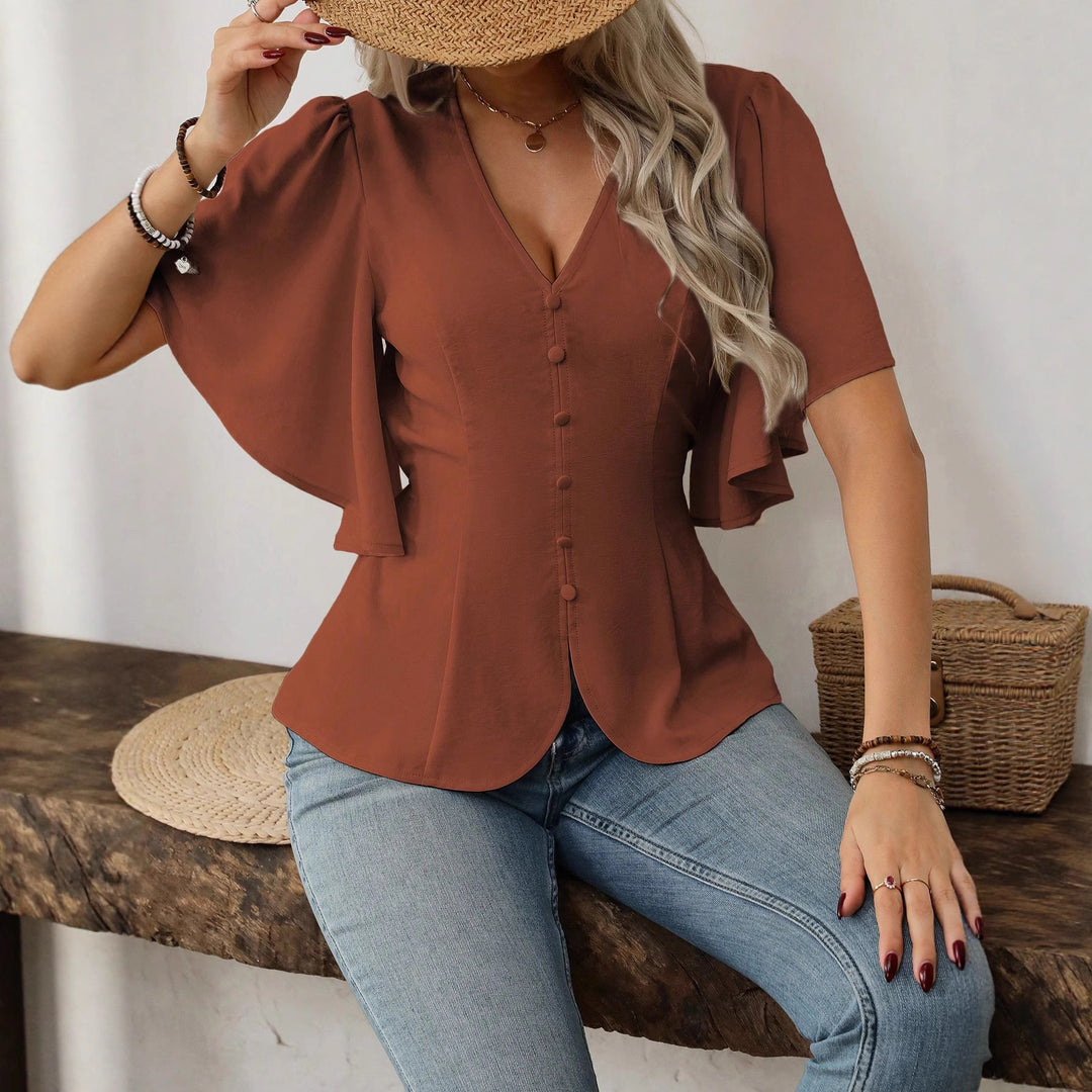 Damer elegant bluse med klokkeærmer og knapdetalje Skovae