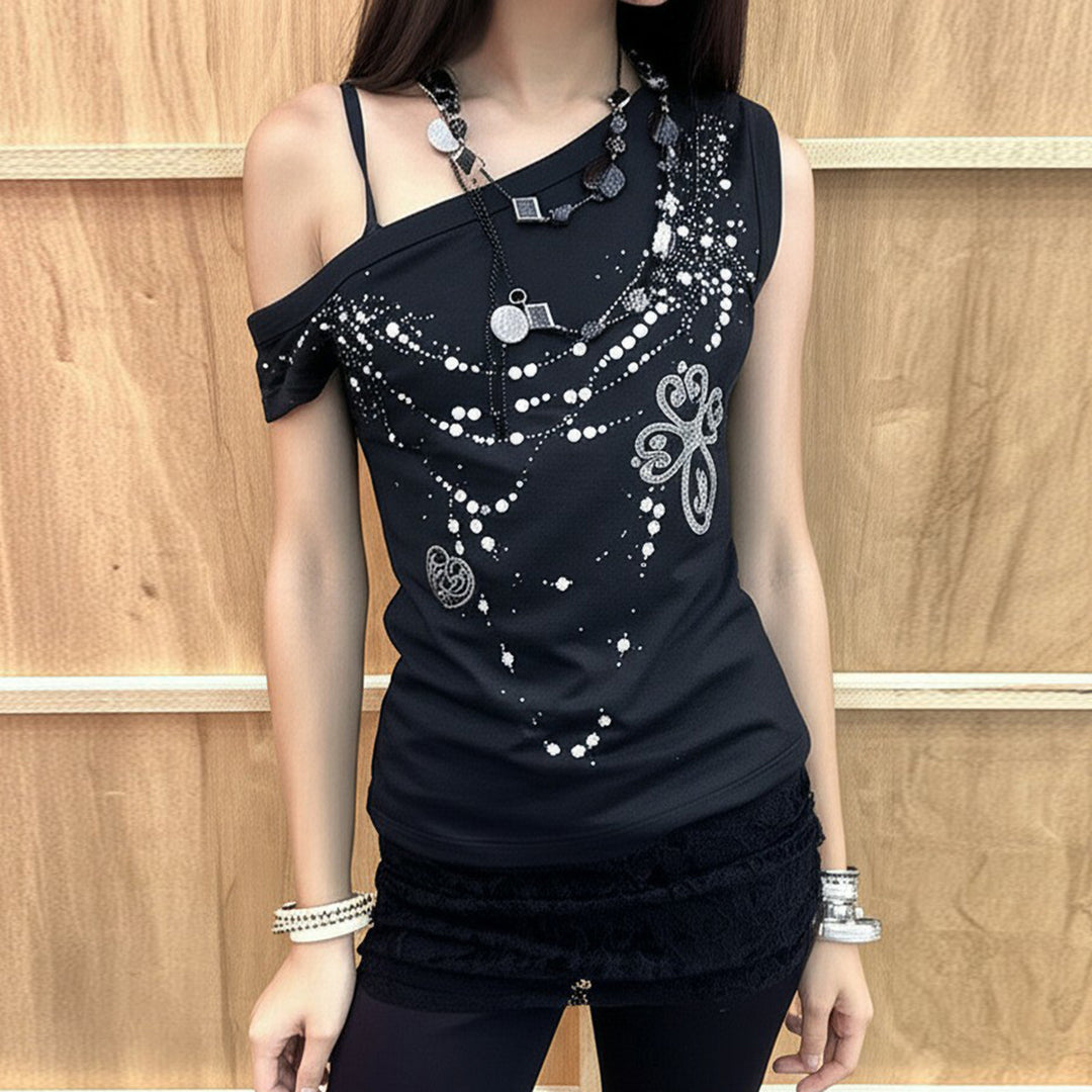 Dame top med off-shoulder design og funklende detaljer Skovae