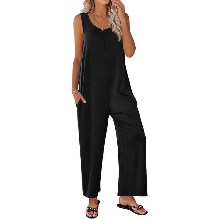Dame afslappet jumpsuit med praktiske lommer og vidt skåret ben Stilla