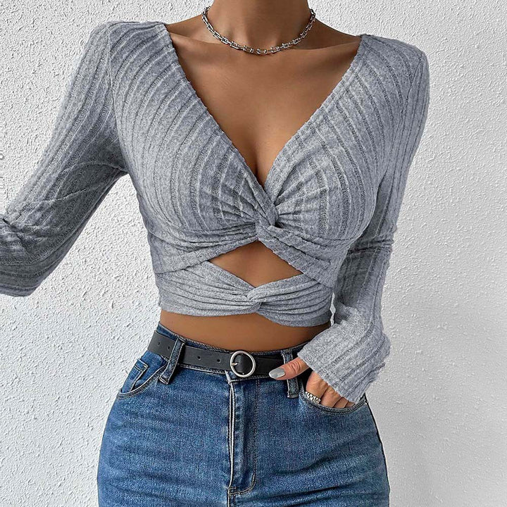 Kvindernes cropped top med tidløst twist design og lange ærmer Stilla