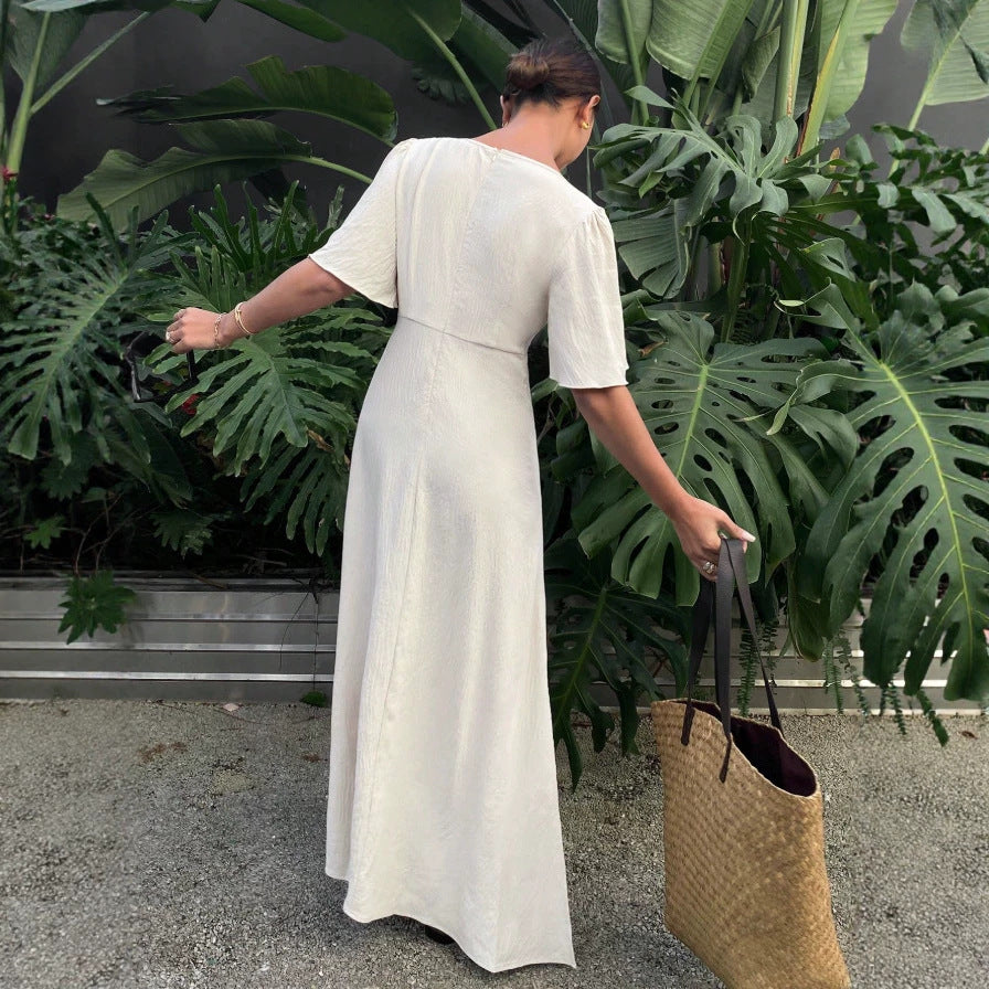 Dame maxikjole med flydende ærmer og V-udskæring Skovae