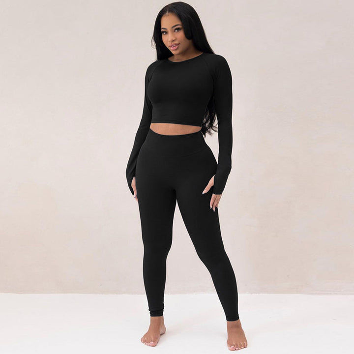 Dame Sporty sæt bestående af langærmet top og leggings med høj talje og figursyet pasform Stilla