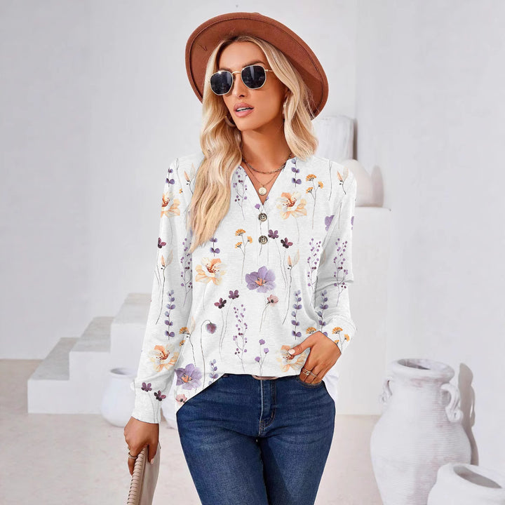 Damebluse med blomster mønster og knap detaljer Stilla