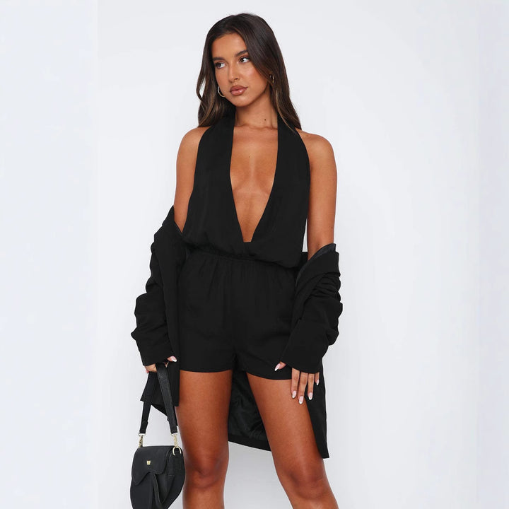 Dame fashion jumpsuit med dyb V-udskæring og elastisk talje Skovae