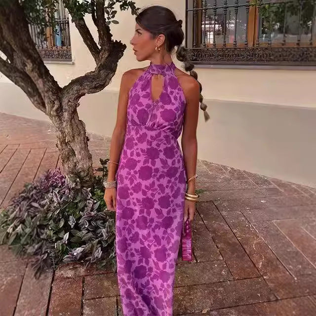 Dame maxikjole med floral trykdesign og elegant split Stilla