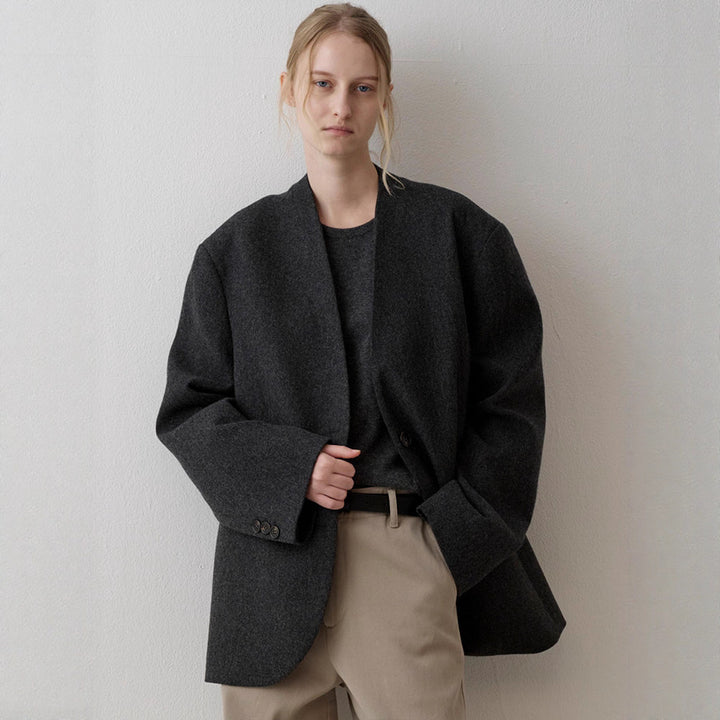 Kvinders elegante strikket blazer med asymmetrisk snit Stilla