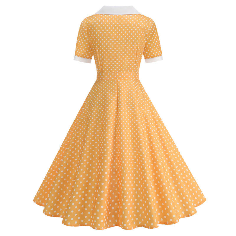 Dame Vintage Polka-Dot Kjole med knapdetaljer og svajende skørt Skovae