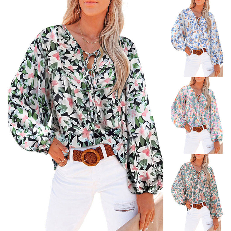 Damebluse med blomsterdesign og voluminøse ærmer Stilla