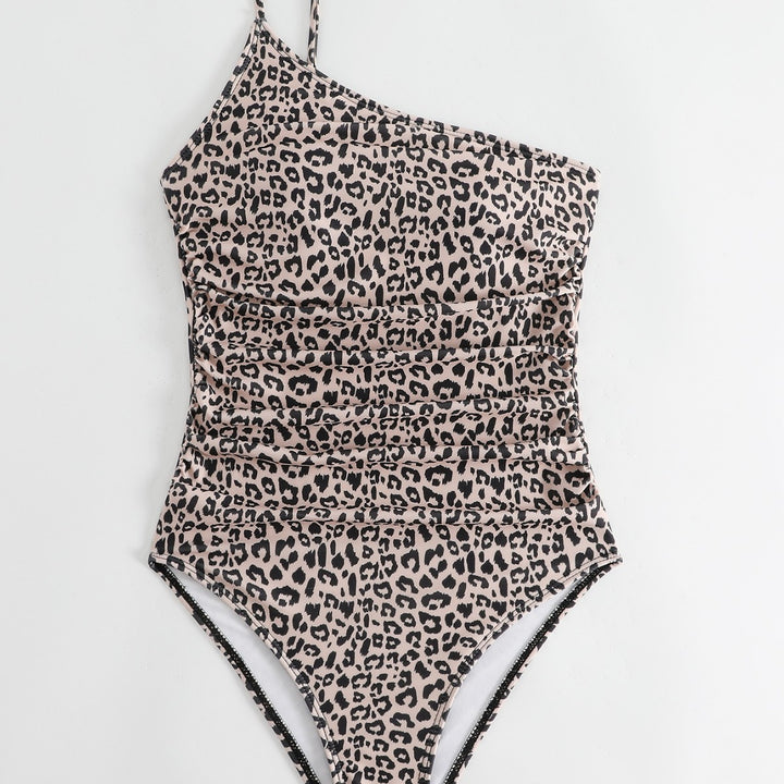 Dame én-delt badesuit med trendy leopardmønster og figurformende snit Stilla