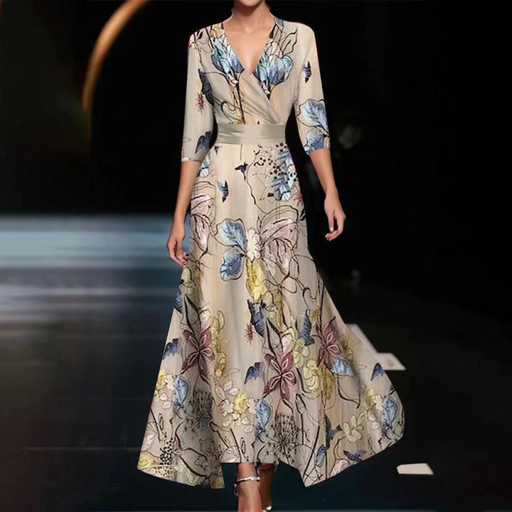 Dame Maxikjole med elegant floral design og dyb V-udskæring Stilla