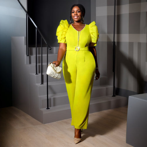 Dame elegant jumpsuit med voluminøse puffærmer og perleaccent Skovae