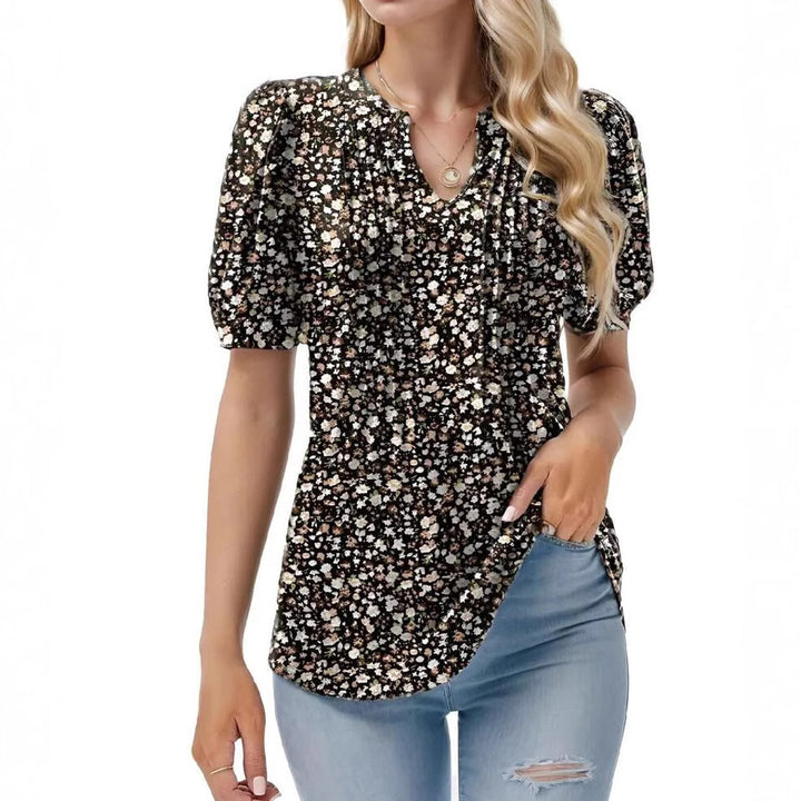 Damebluse med flæseærmer og blomsterdesign Stilla