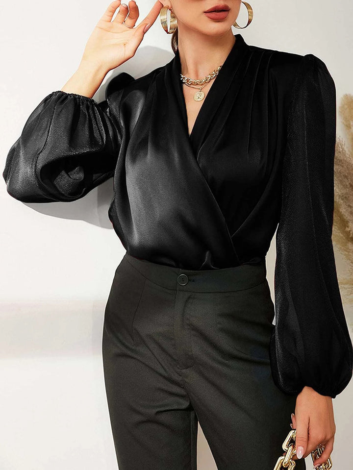 Damebluse med elegant vikleeffekt og gennemsigtige ærmer Stilla