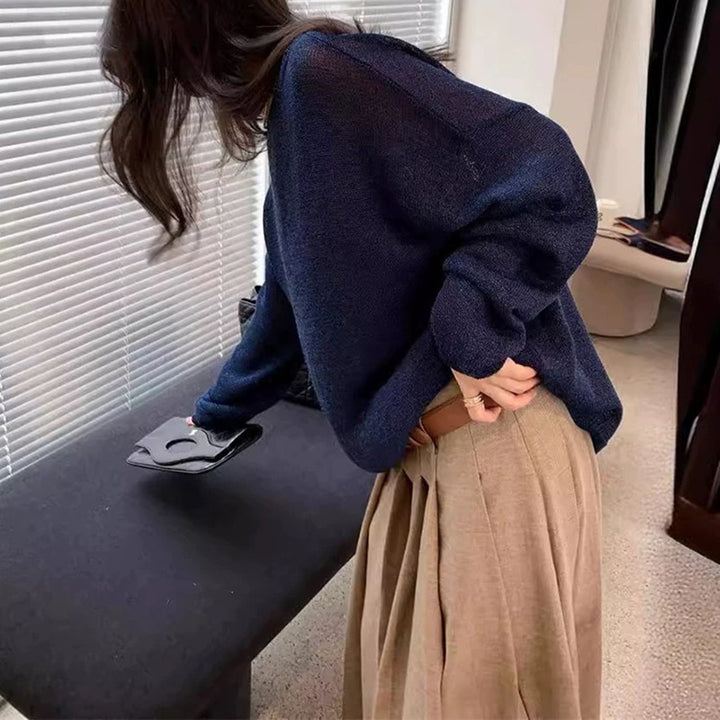 Dame afslappet strikpullover med bredt skåret ærme og tidløst design Stilla