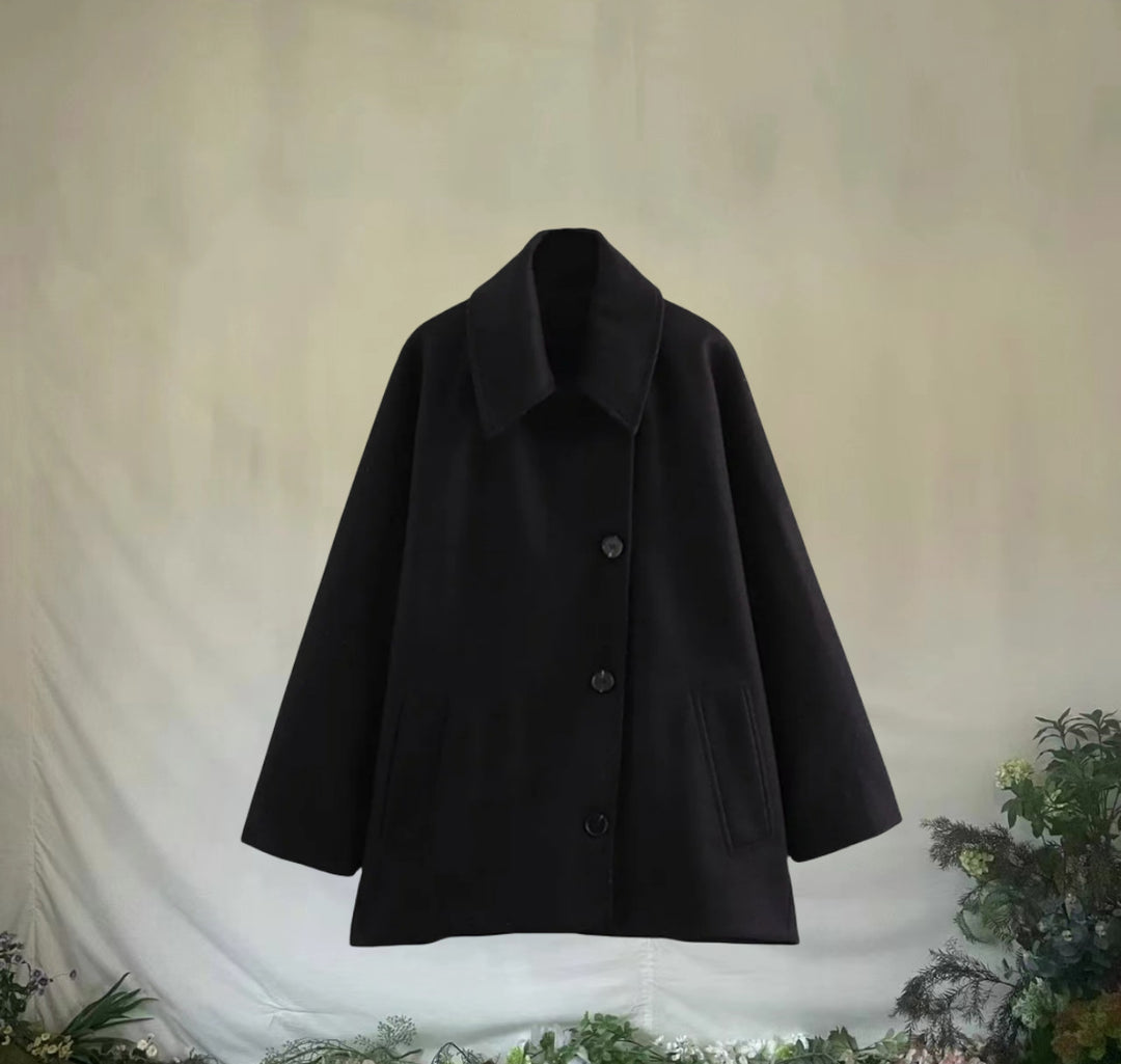 Dame Oversized Uldjakke med store lommer og elegant Replay Stilla