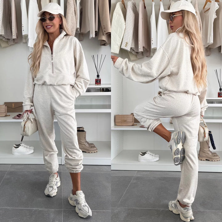 Kvinders trendy sweat suit med halvlange lynlås og elastisk talje Skovae
