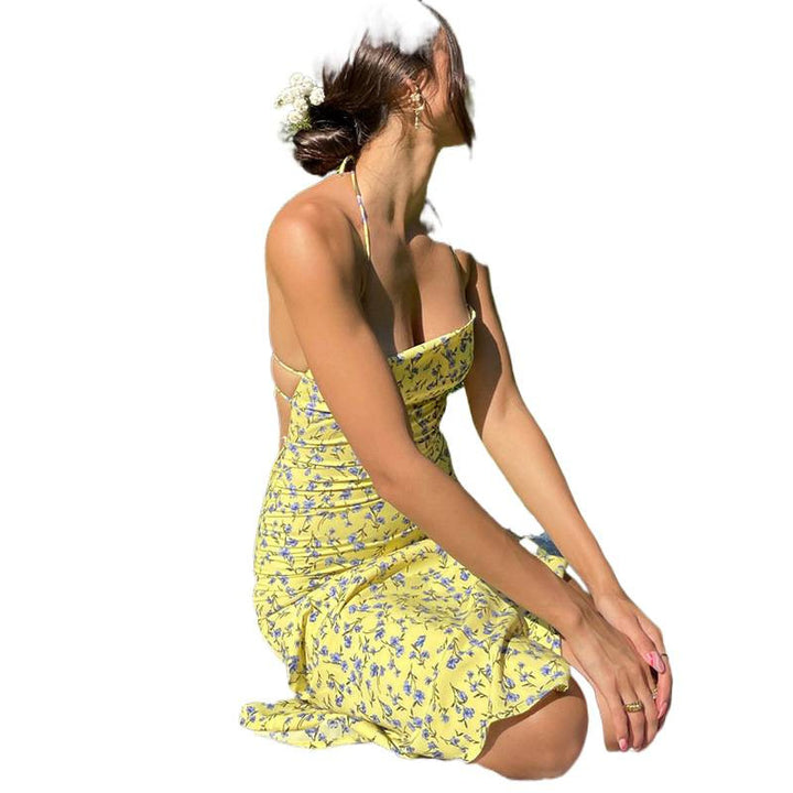 Dame pencil dress med blomstret design og elegante spaghetti-stropper Skovae