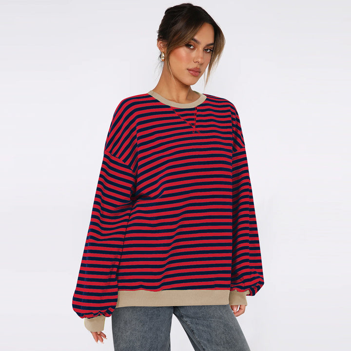 Dame Oversized Sweatshirt med stribet design og komfortable pufærmer Stilla