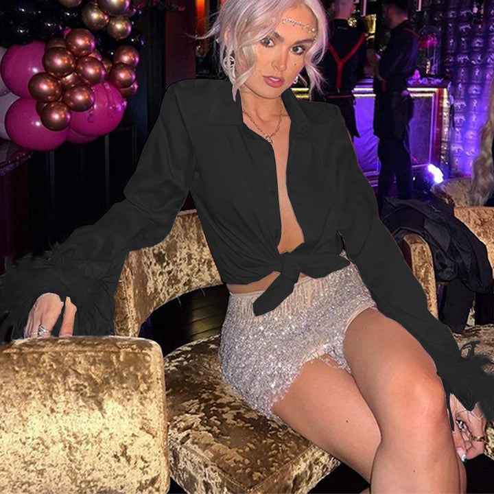 Dame stilfuldt top med punkmønster og elegante kaftanærmer Stilla