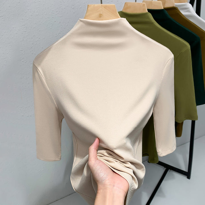 Dame Kortærmet Turtleneck Top i strækbart materiale med figursyet snit Stilla