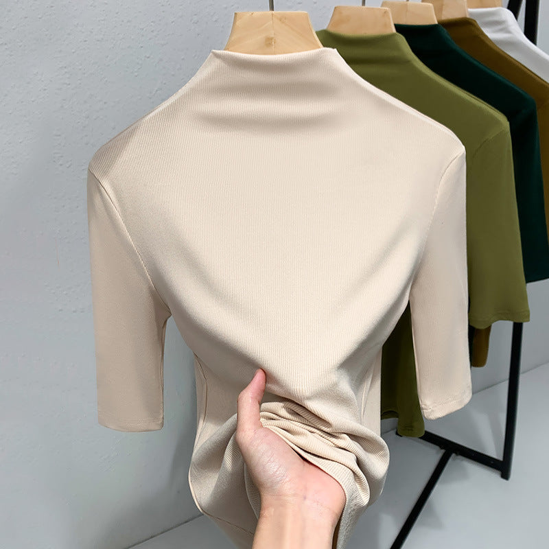 Dame Kortærmet Turtleneck Top i strækbart materiale med figursyet snit Stilla