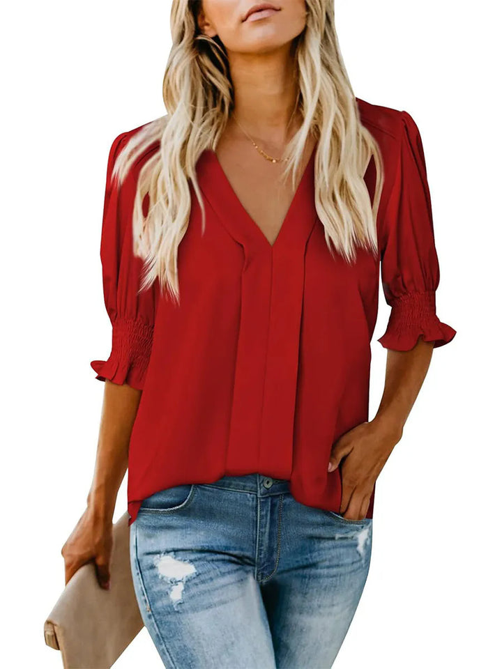 Dame elegant bluse med V-udskæring og flæsedetaljer Stilla