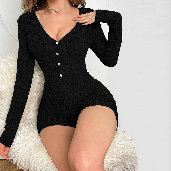 Kvinders strikkede jumpsuit med dyb V-hals og knapdetaljer Stilla