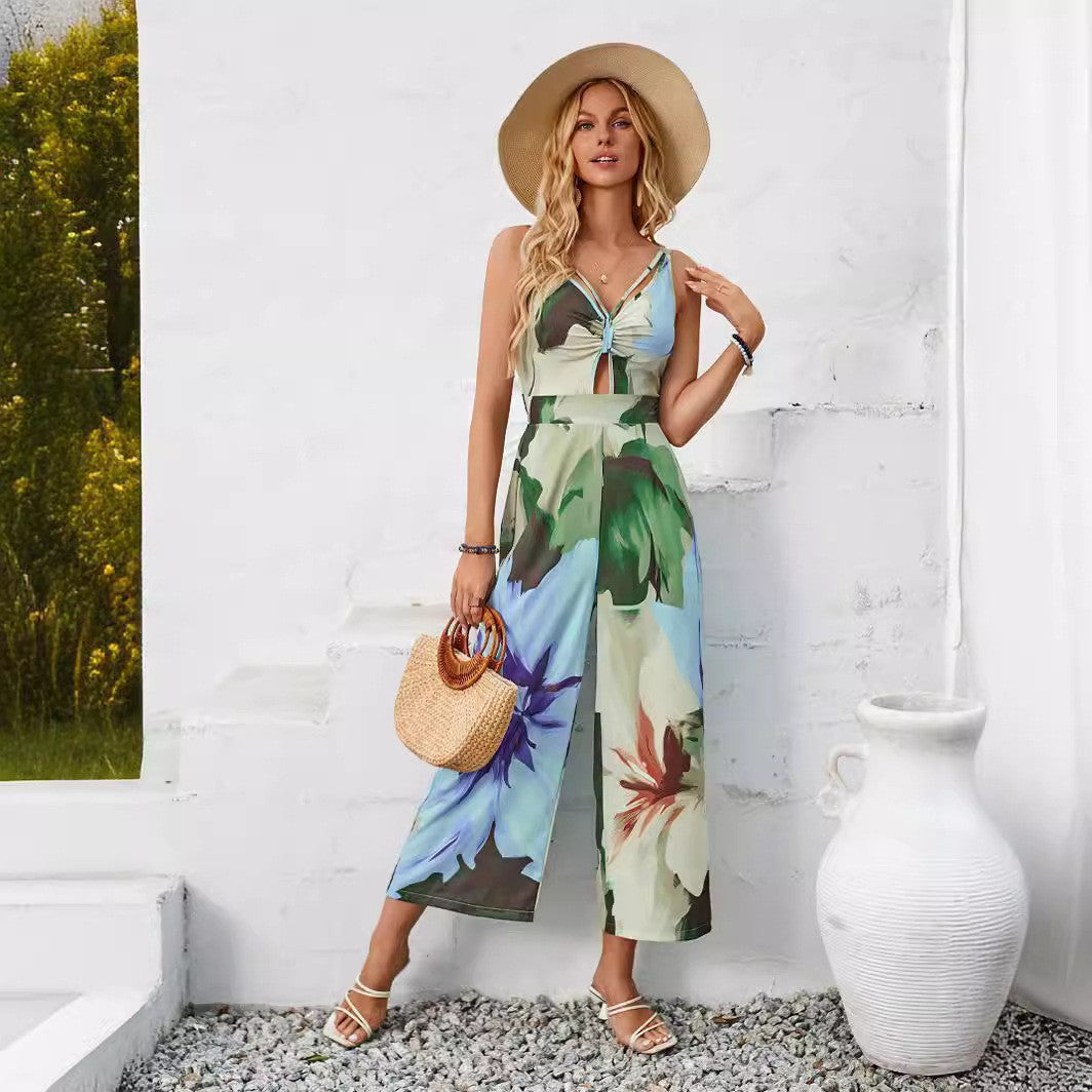 Dame jumpsuit med blomsterprint og bindebælte Stilla