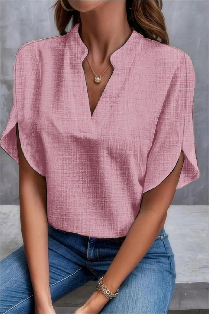 Dame elegant kortærmet bluse med moderne ståkrave og casual sideslidser Stilla