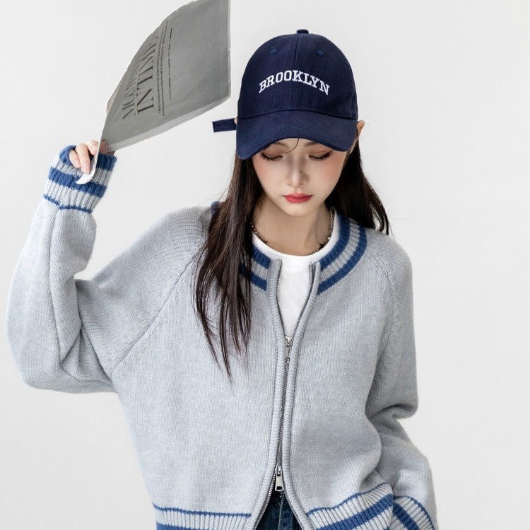 Kvinders sporty strik cardigan med lynlås og stribet manchet Stilla
