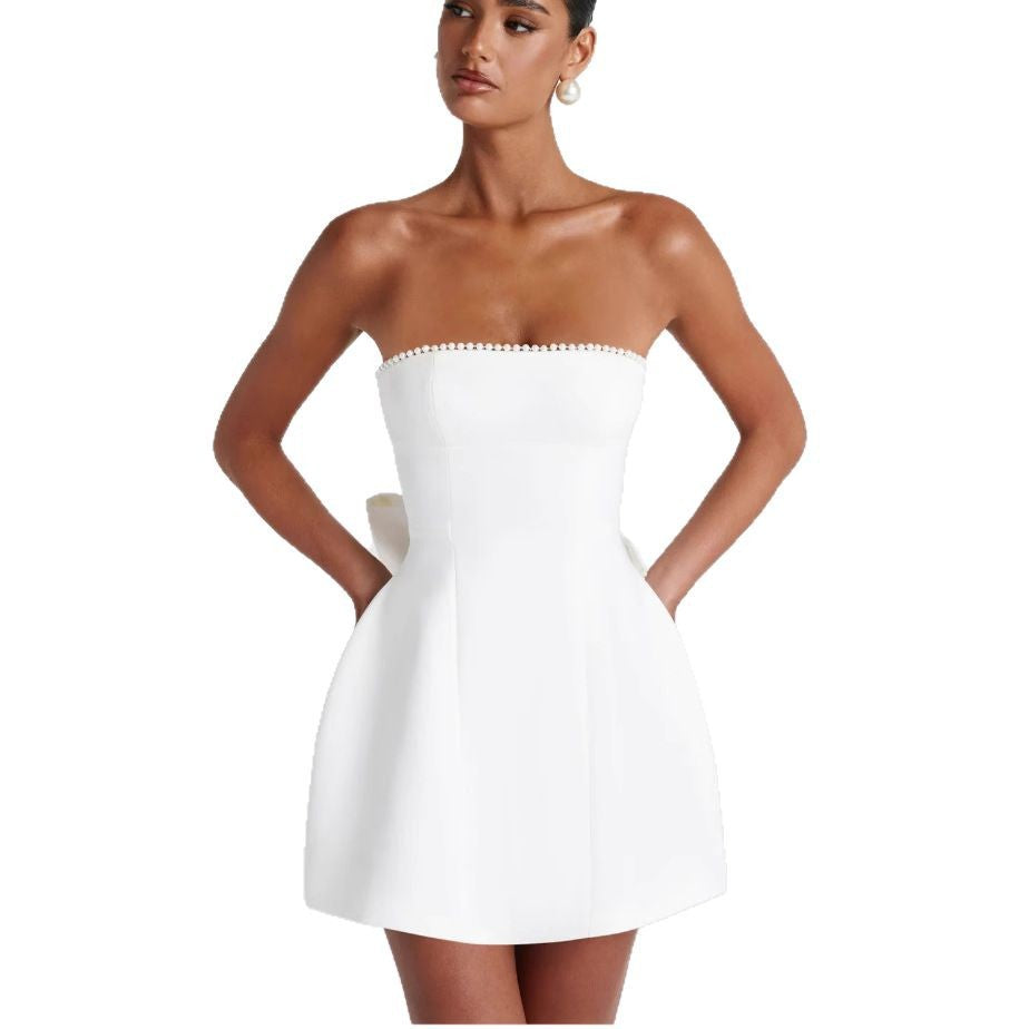 Dame minikjole med elegant bustier-overdel og trendy ruffle-detaljer Stilla