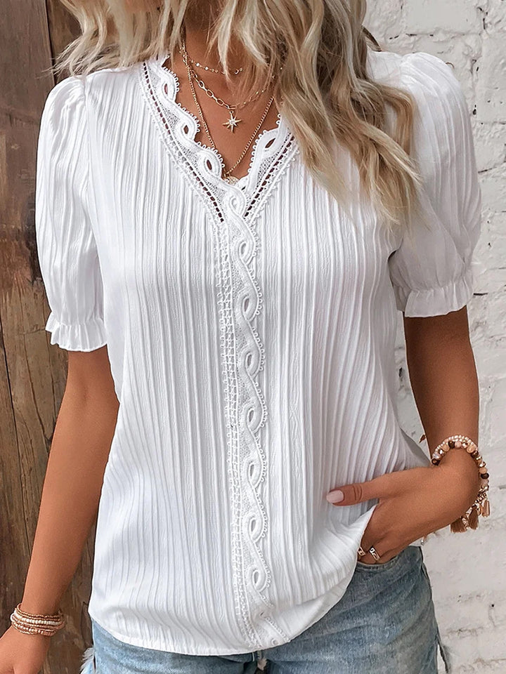 Dame Trendy Bluse med struktur og romantiske spidsdetaljer Stilla
