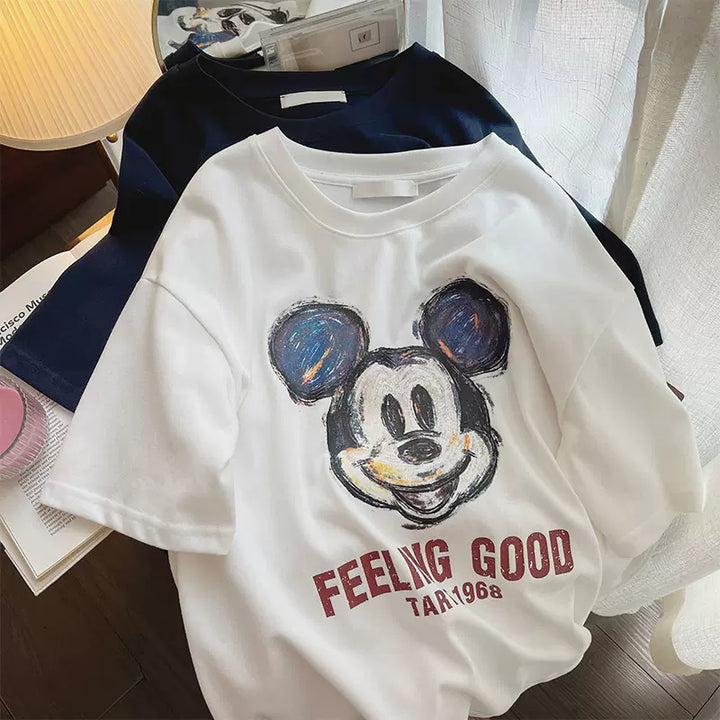 Dame T-shirt med kreativt Mickey Mouse design og afslappet snit Stilla