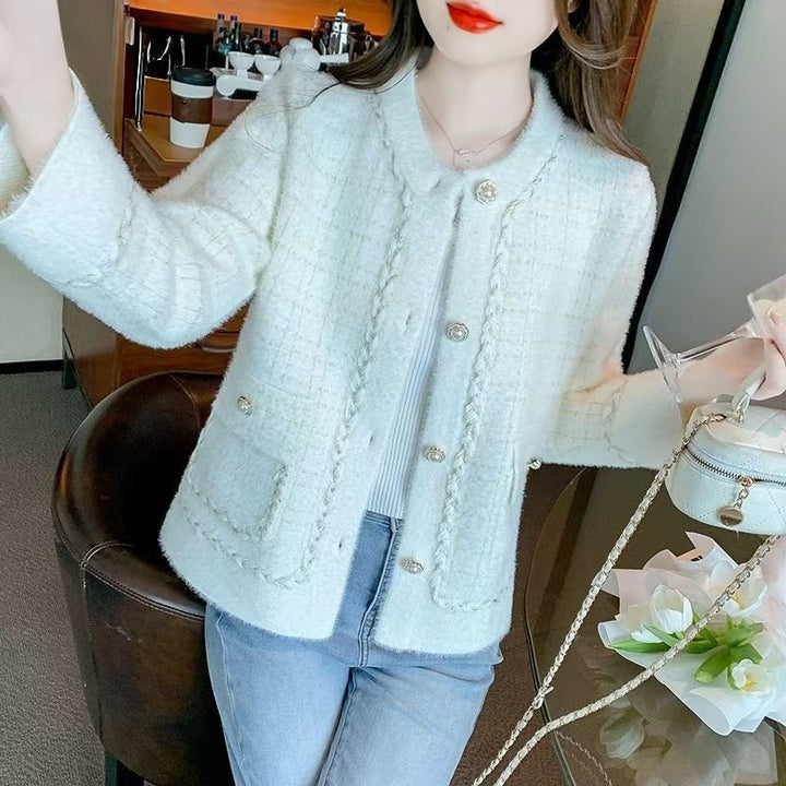 Kvinder elegant bouclé jakke med fine knapdetaljer Stilla