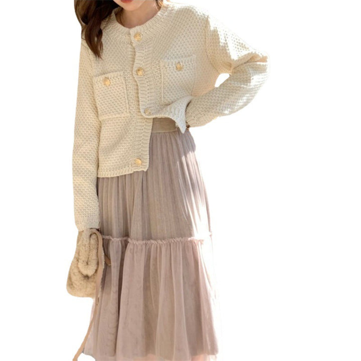 Kvinders cardigan med dekorative knapper og tekstureret design Stilla