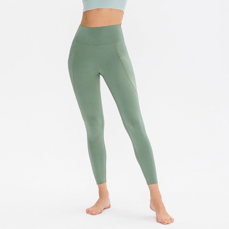 Dame højtydende funktionsleggings med lommer og høj talje Stilla