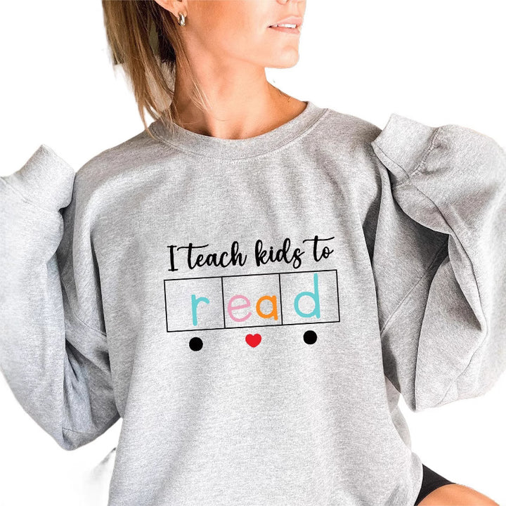 Kvinders sweatshirt med kreativt undervisningsmotiv Stilla