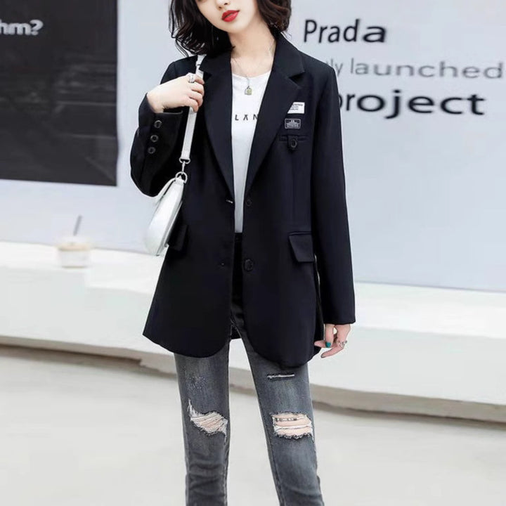 Kvinders elegante oversized blazer med dobbeltknaplukning og moderne detaljer Stilla