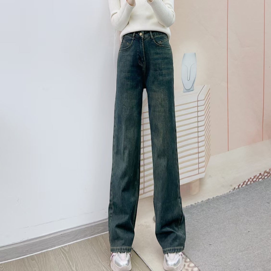 Dame brede high-waist jeans med elegant snit og minimalistiske detaljer Stilla