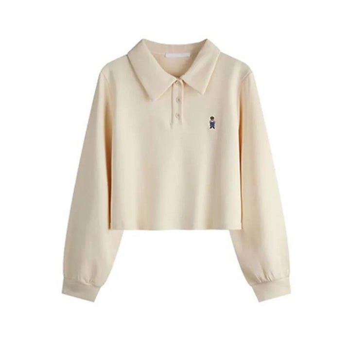 Dame skåret langærmet polo-top med stilfuld broderi Stilla