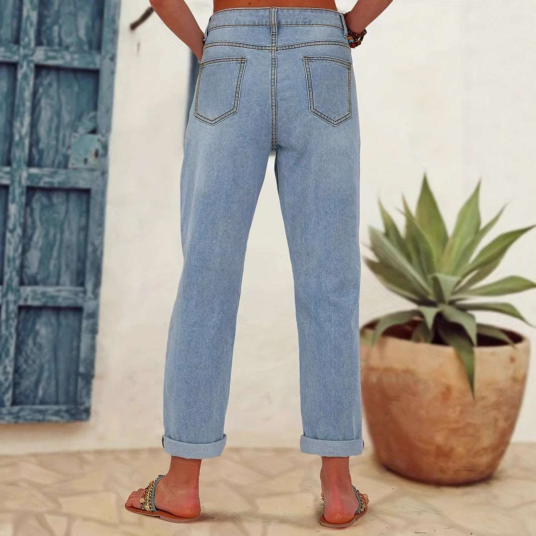 Damejeans med blomstret design og fashionable revnedetaljer Stilla