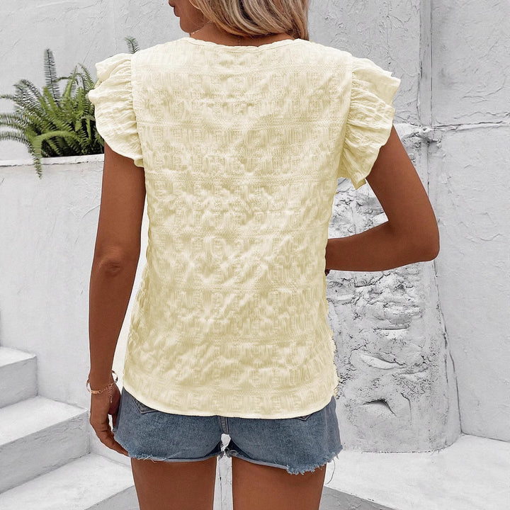 Damebluse med volant og håndlavet broderidesign Stilla