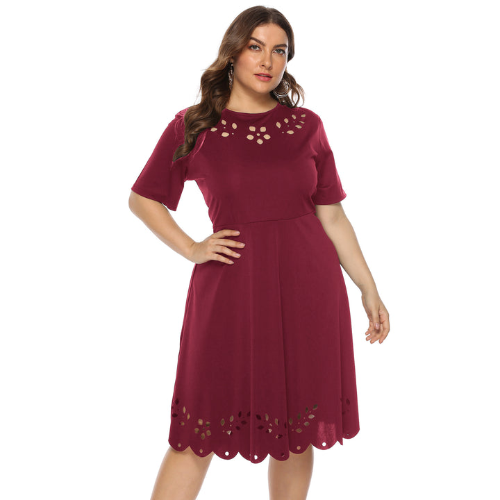Dame Midikjole med elegante cut-out dekorationer og volumøs kant Stilla