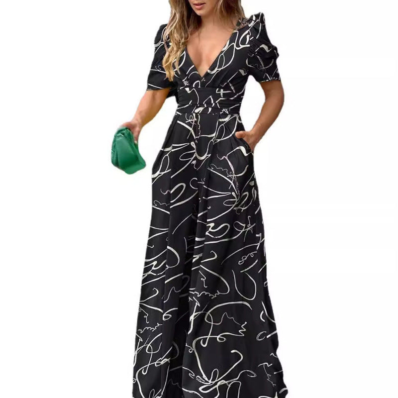 Femme Tropical Print Maxi Kjole med flatterende Vikkel-design Stilla