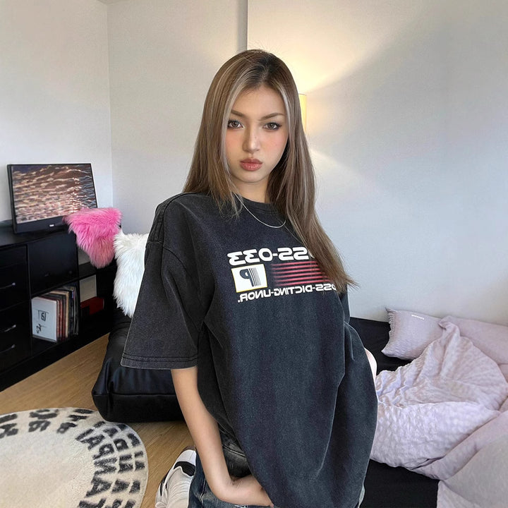 Damer Oversized T-shirt med retro-inspireret grafik og afslappet snit Stilla