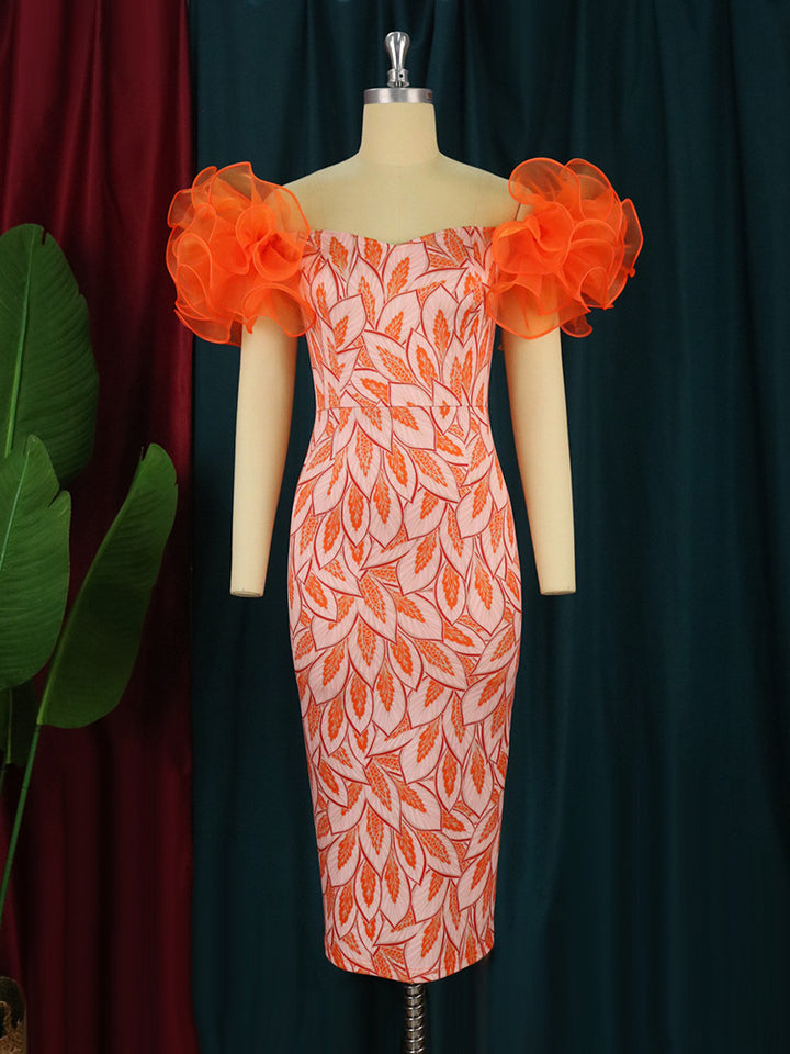 Dame Elegante Midi-Kjole med innovative puffærmer og kunstnerisk tryk Skovae