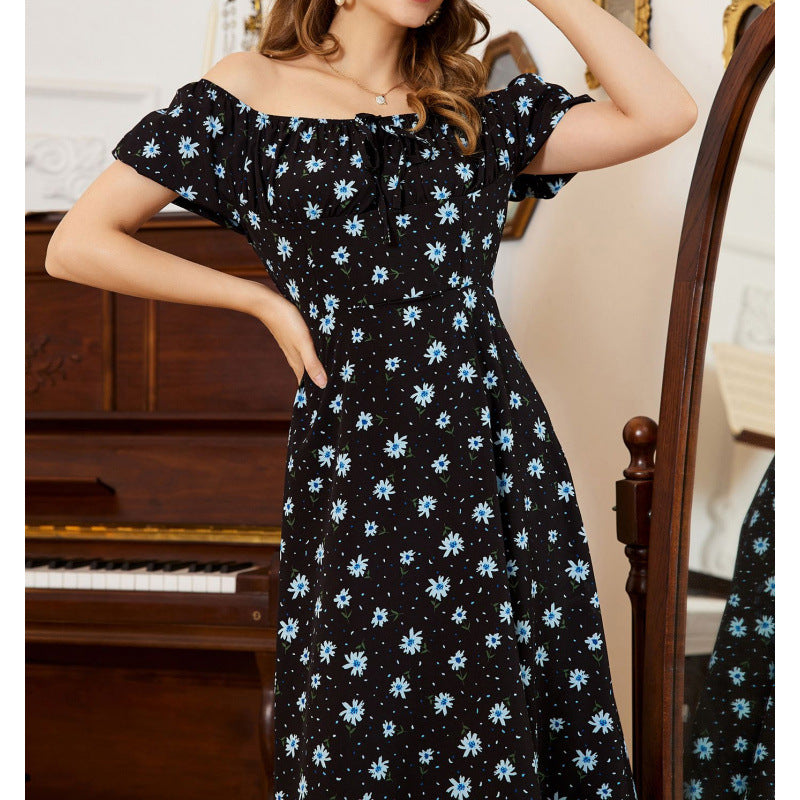 Dame maxikjole med voluminøse flæseærmer og floralt design Skovae