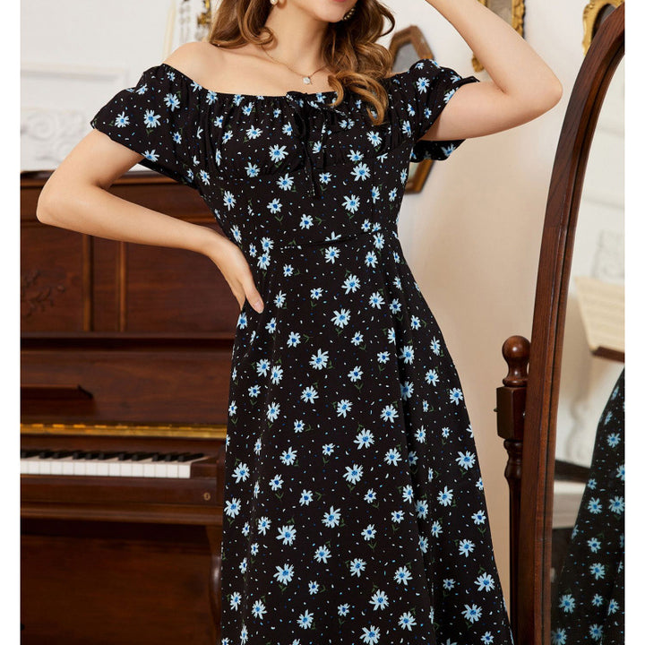 Dame maxikjole med voluminøse flæseærmer og floralt design Skovae